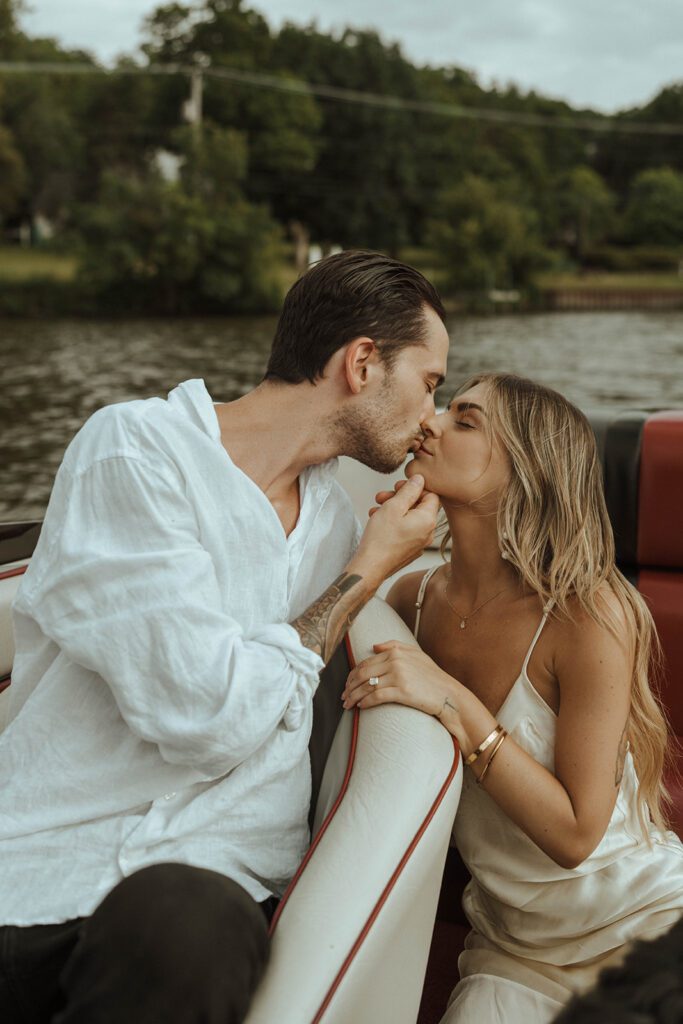couple kissing during their photoshoot 