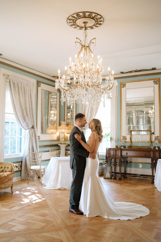 cute couple dancing during their bridal portraits 