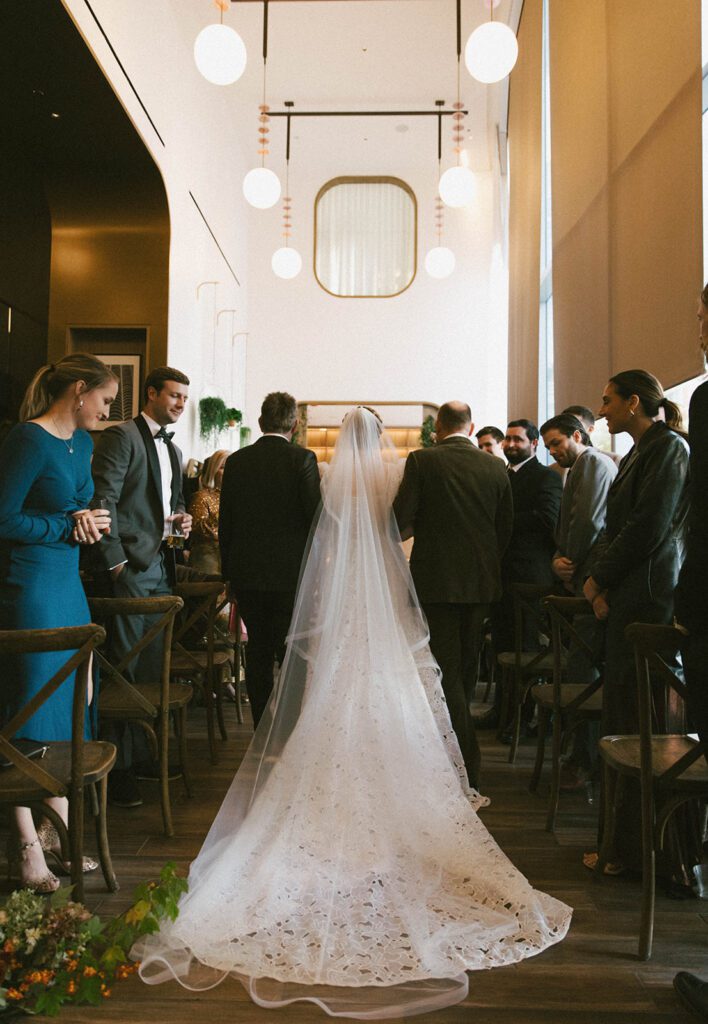 stunning picture of the bride walking down the aisle