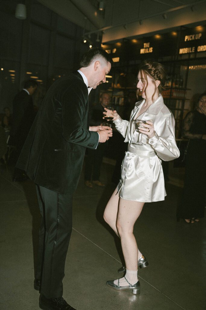 happy couple dancing at their reception party