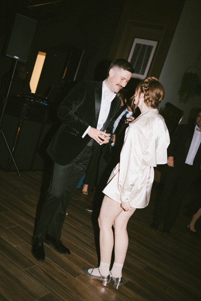 couple having the best time at their reception party