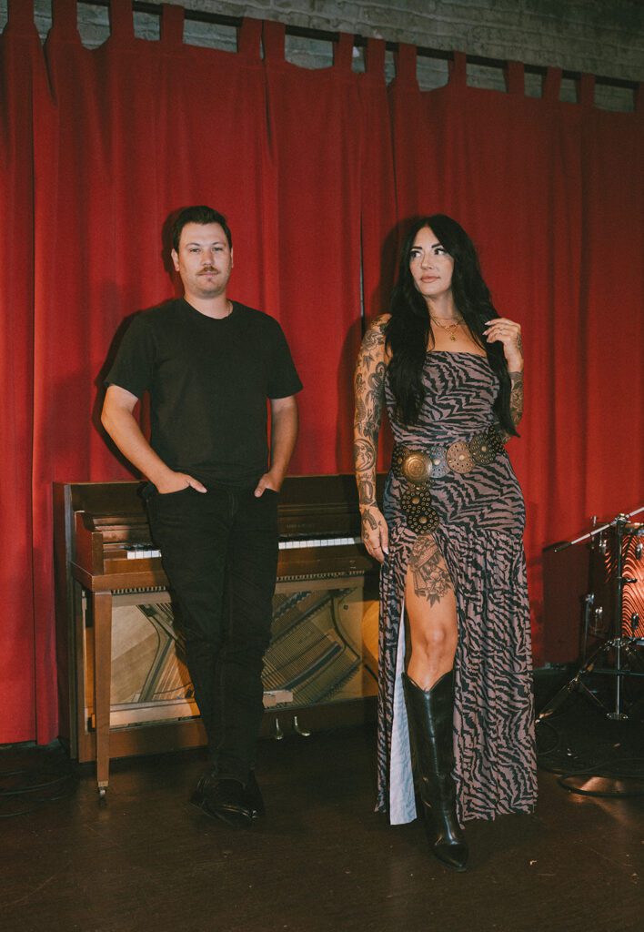 A couple posing for photos in their couples photoshoot