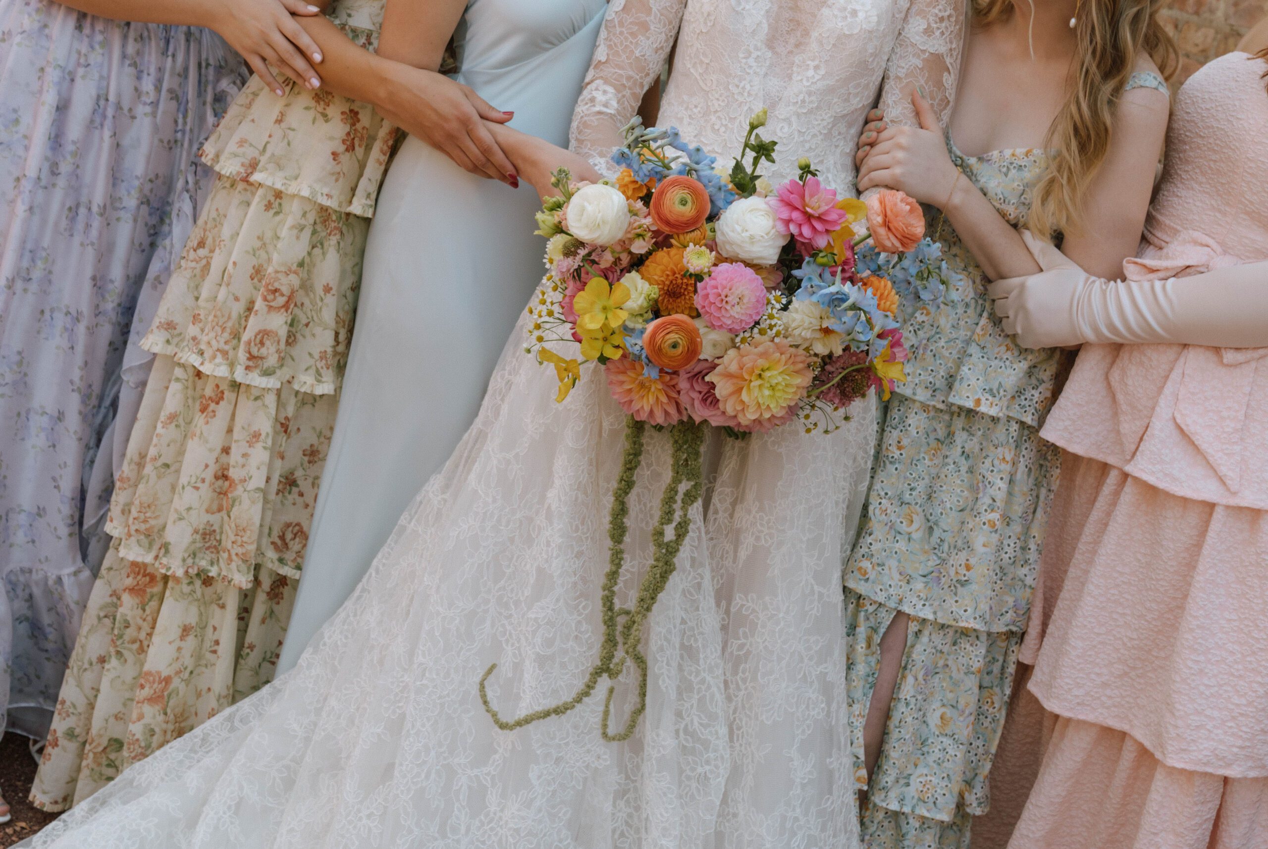 A unique bridesmaid photo taken from a pastel spring garden party wedding at Blumen Gardens