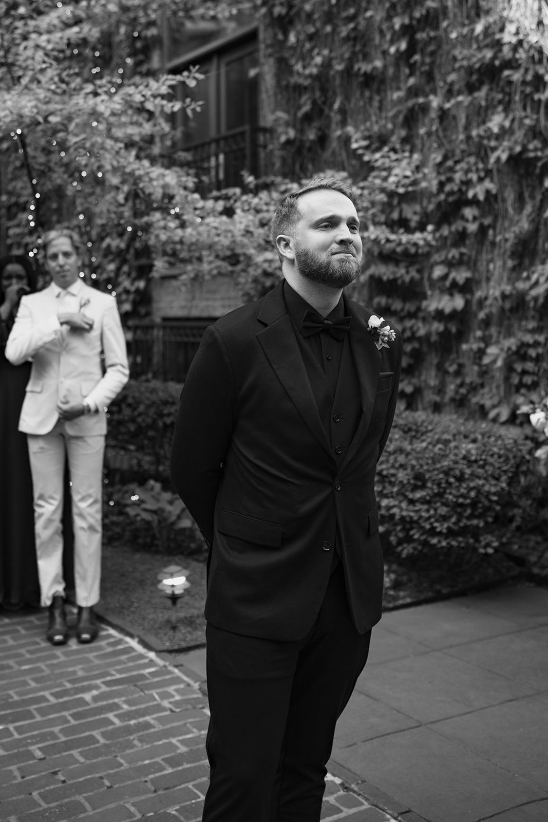 A groom's reaction to a bride walking down the aisle