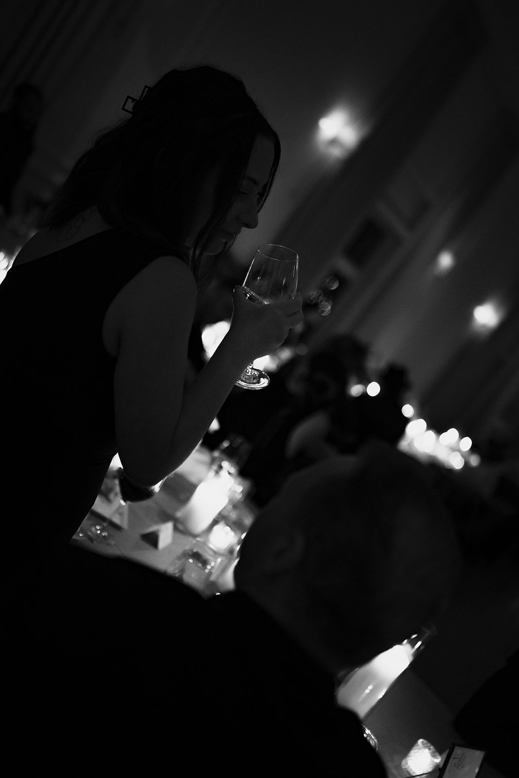 A wedding guest at a wedding reception at the ivy room