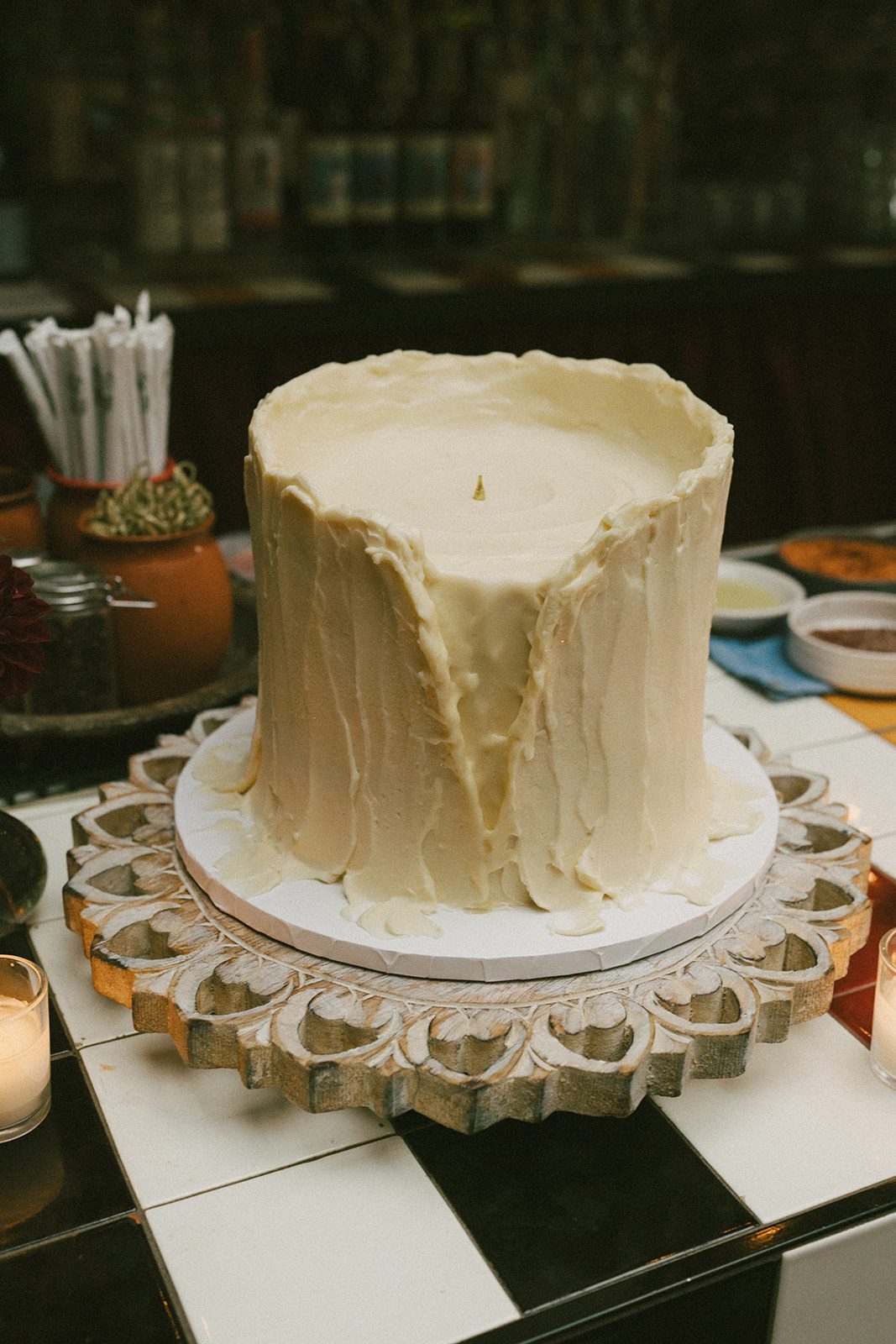 A wedding cake shaped like a candle