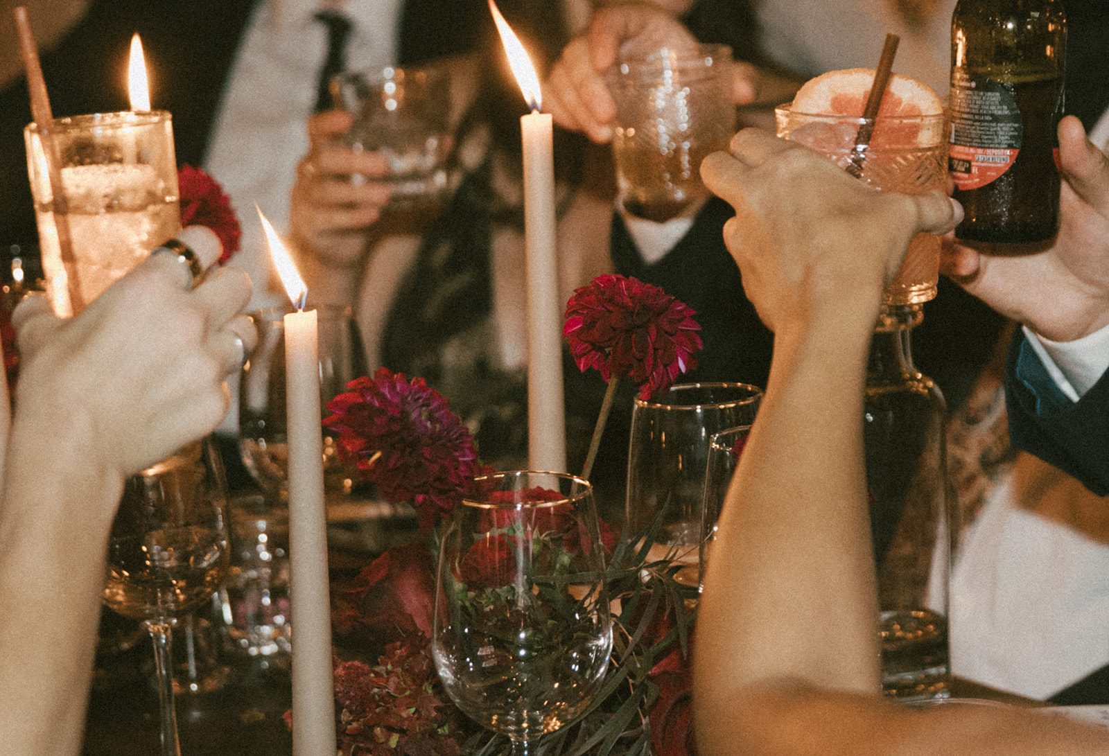 Guests clinking their drinks for a toast at a Beatnik West Town wedding