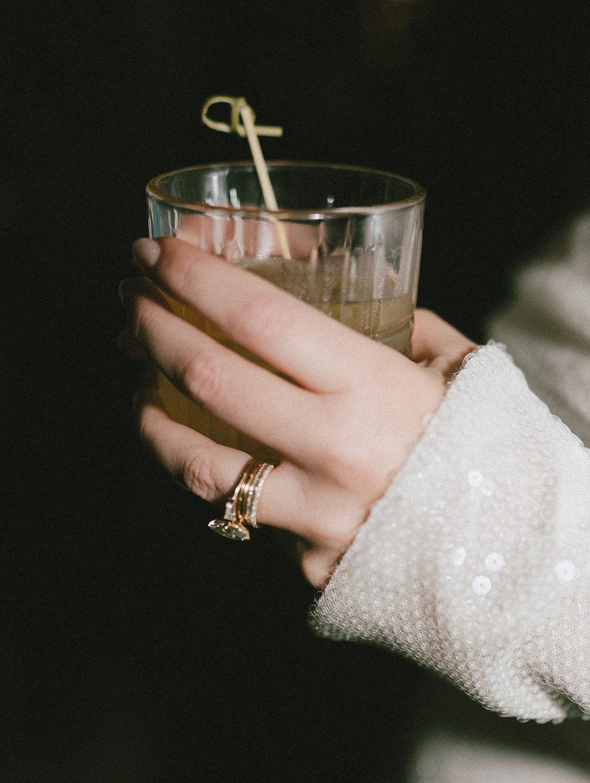 A bride carrying a cocktail