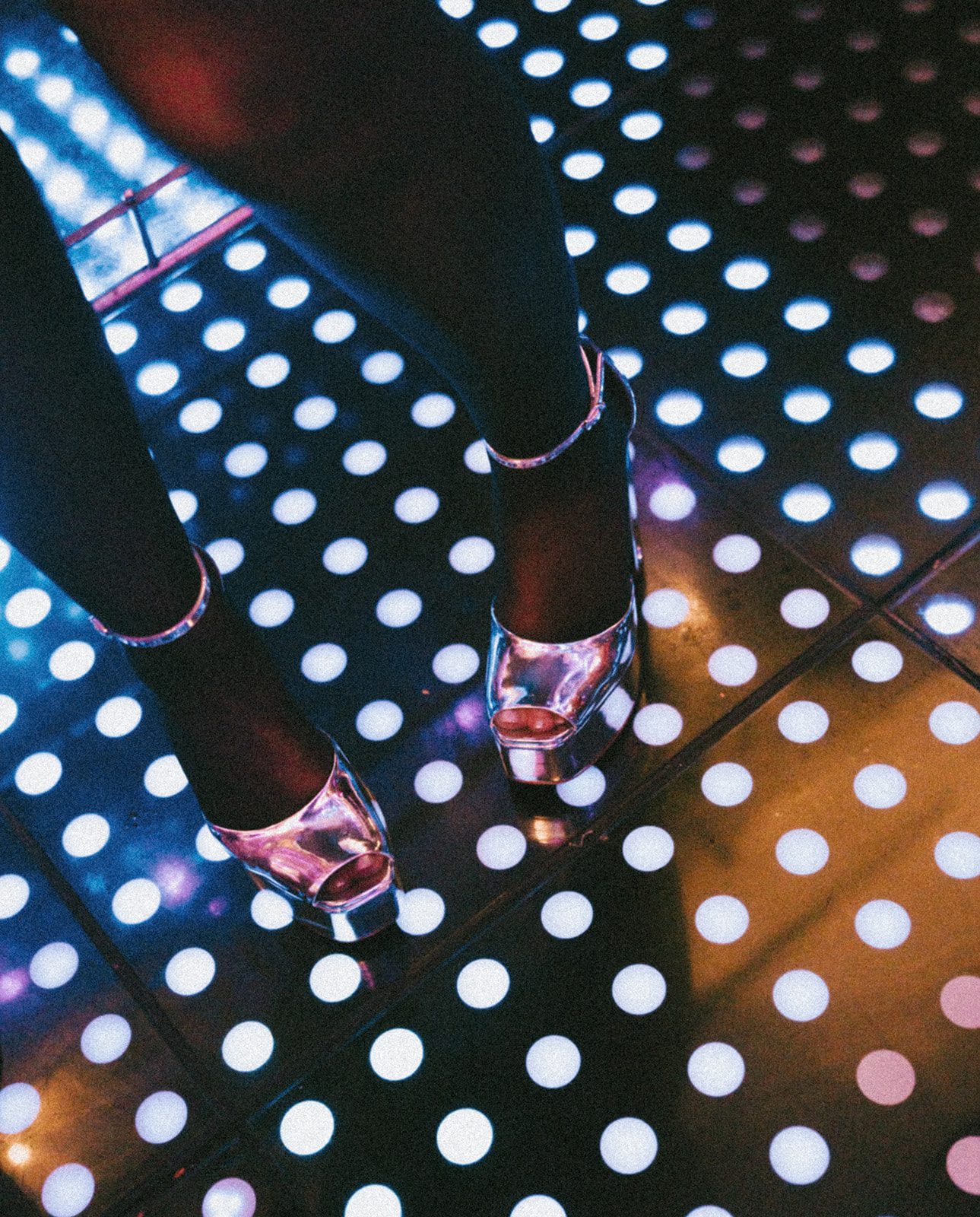 A wedding guest's shoes on the dance floor at celeste chicago