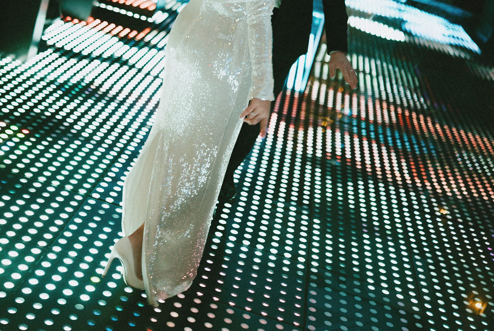 A couple's feet on a disco dance floor at celeste chicago