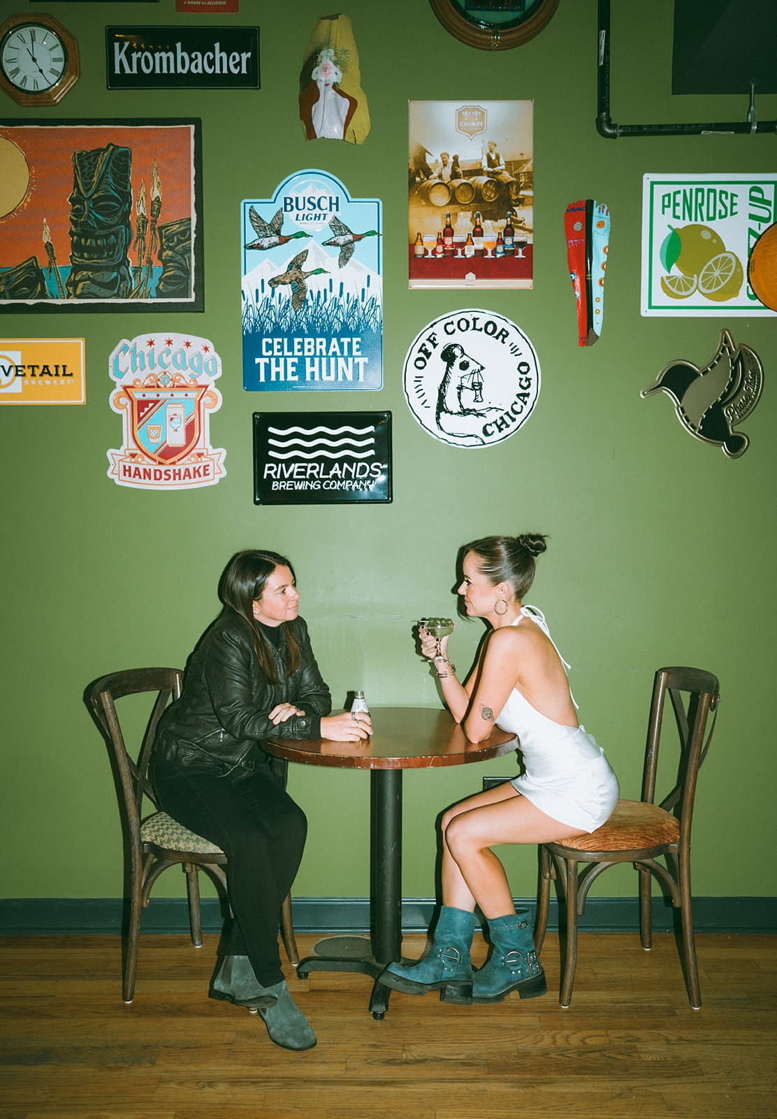  A couple sitting at a table at a bar