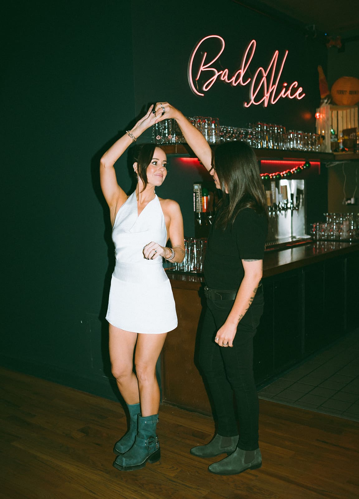 A couple dancing in a bar