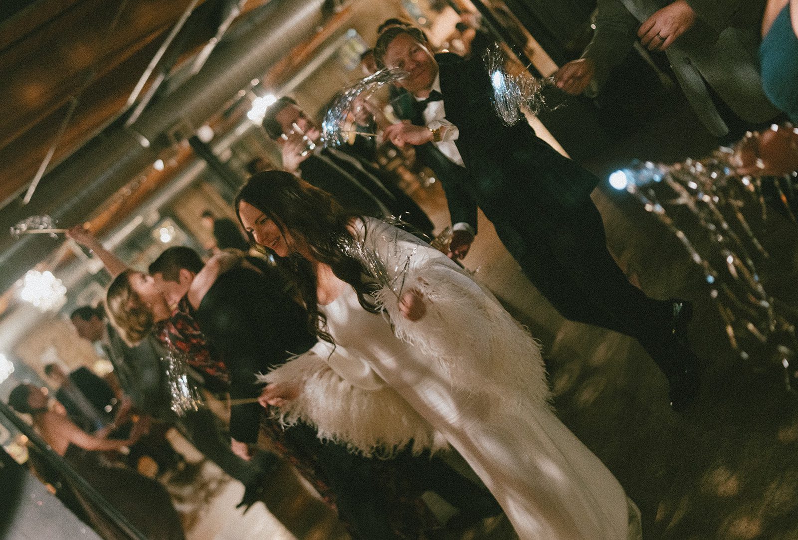 A bride and groom dancing at a wedding reception