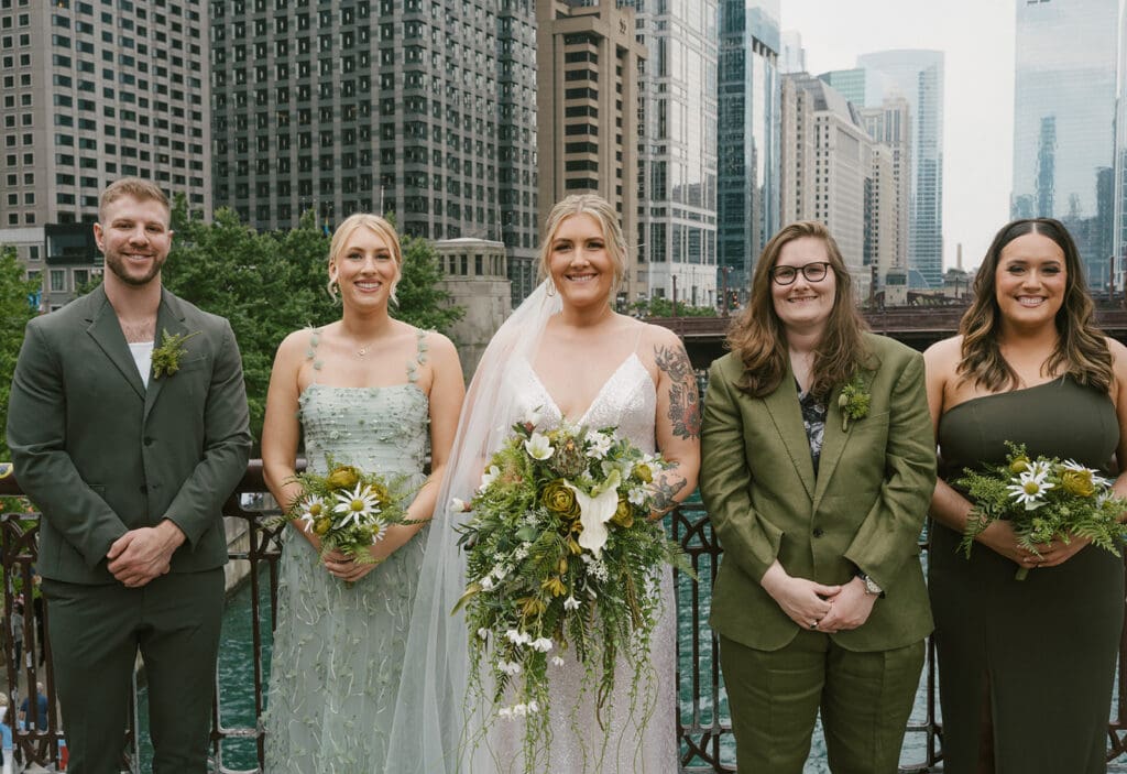 A bridal party taking photos on La Sale Bridge