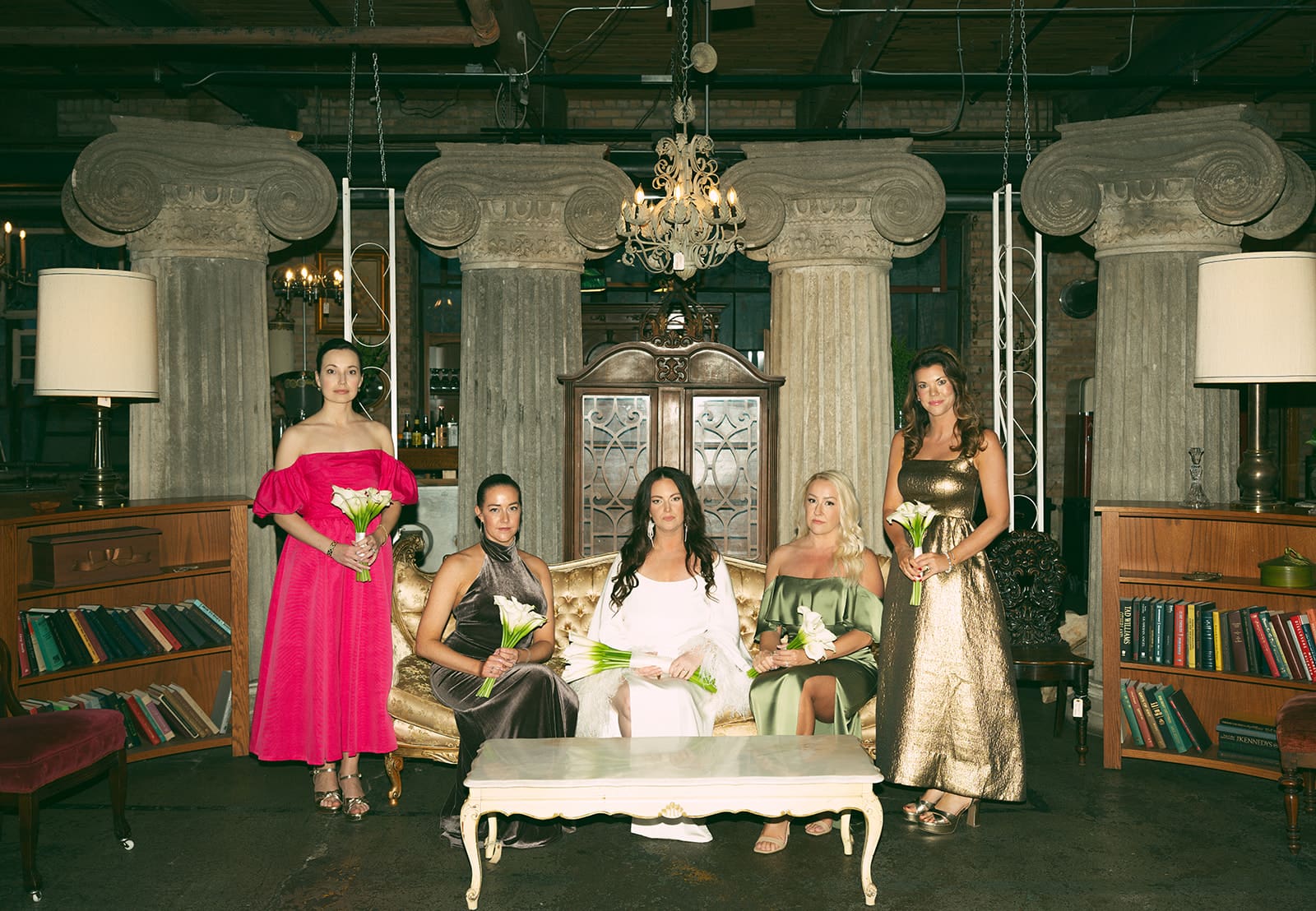 Bridesmaids taking wedding party photos at Salvage One