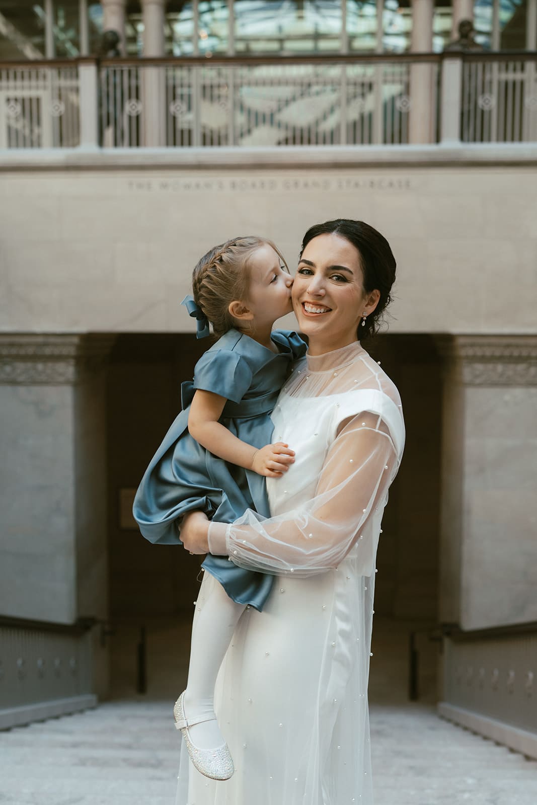 A bride and her daughter inside of the Chicago Art Institute