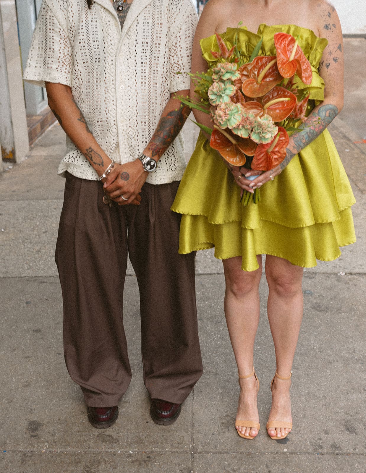 A couple wearing unique engagement photo outfits, showcasing what to wear for engagement photos