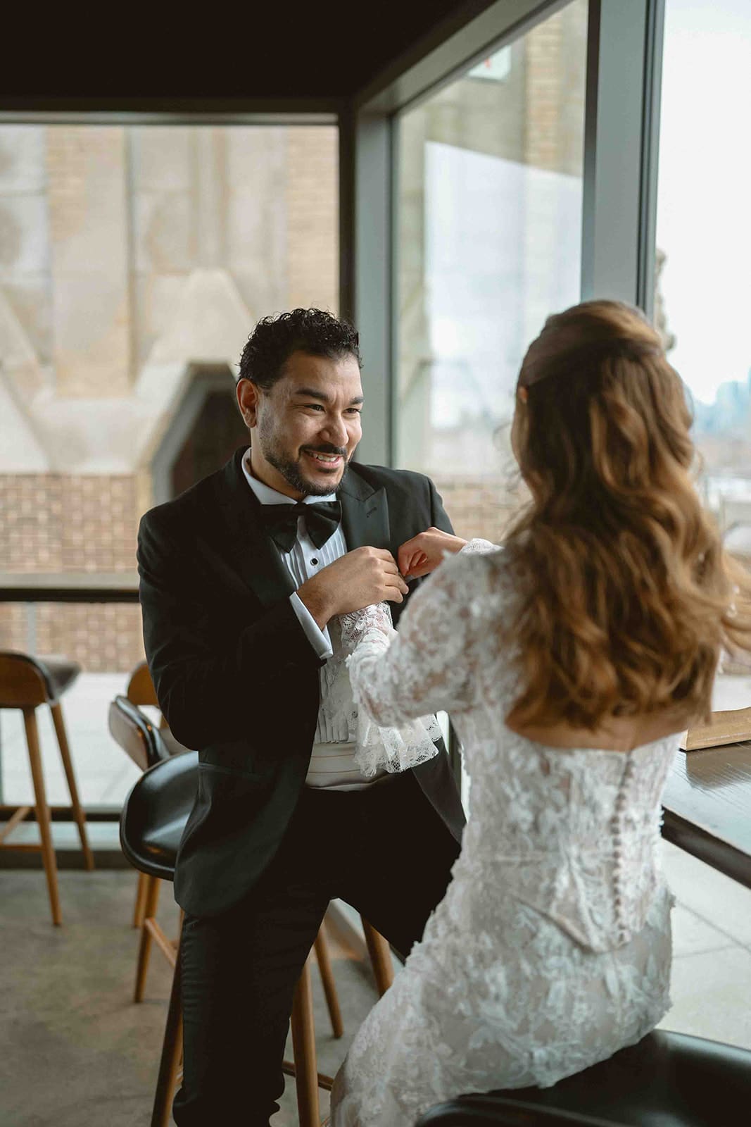 A couple exchanging private vows on the day of wedding