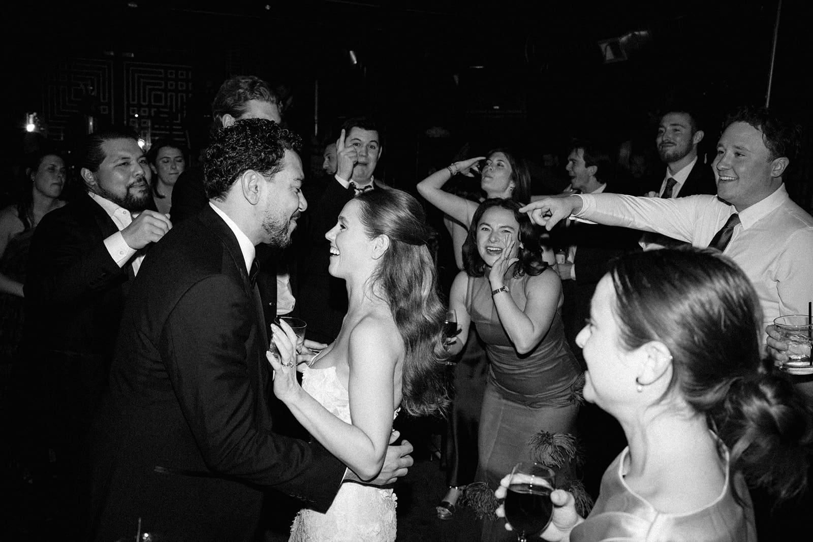 A bride and groom dancing at their day of wedding reception