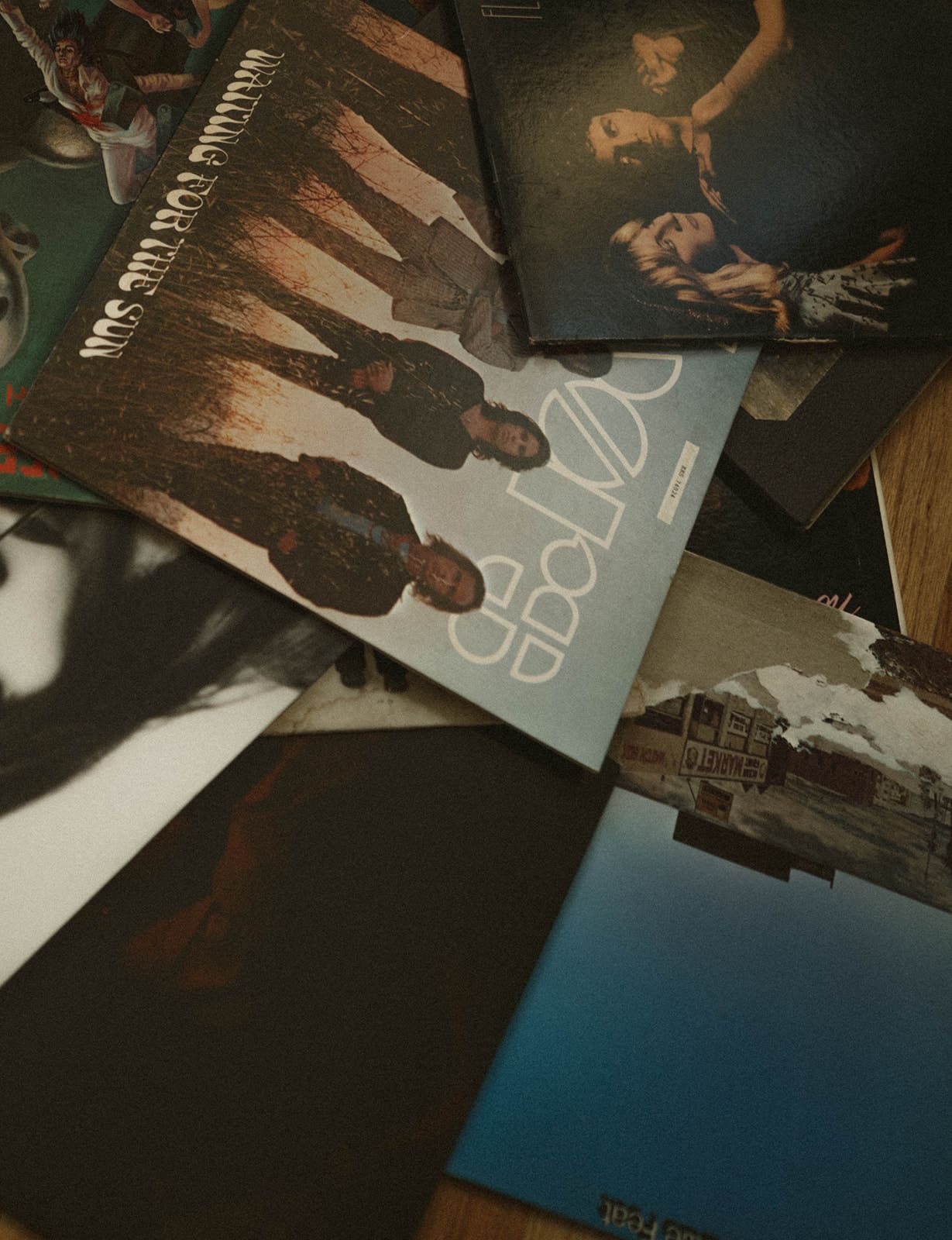 Vinyl records lying on the ground during engagement photos