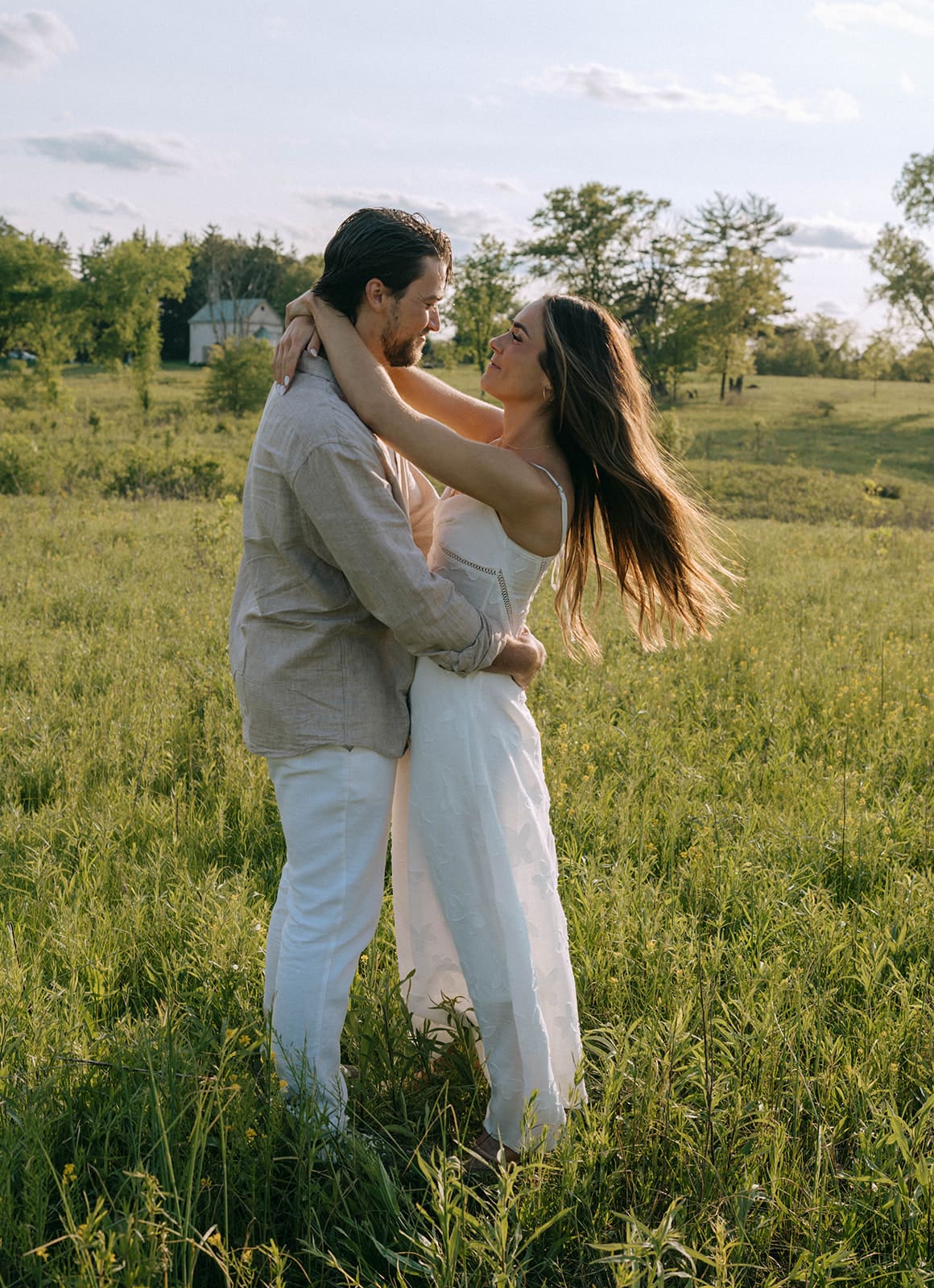 A couple hugging during engagement photos