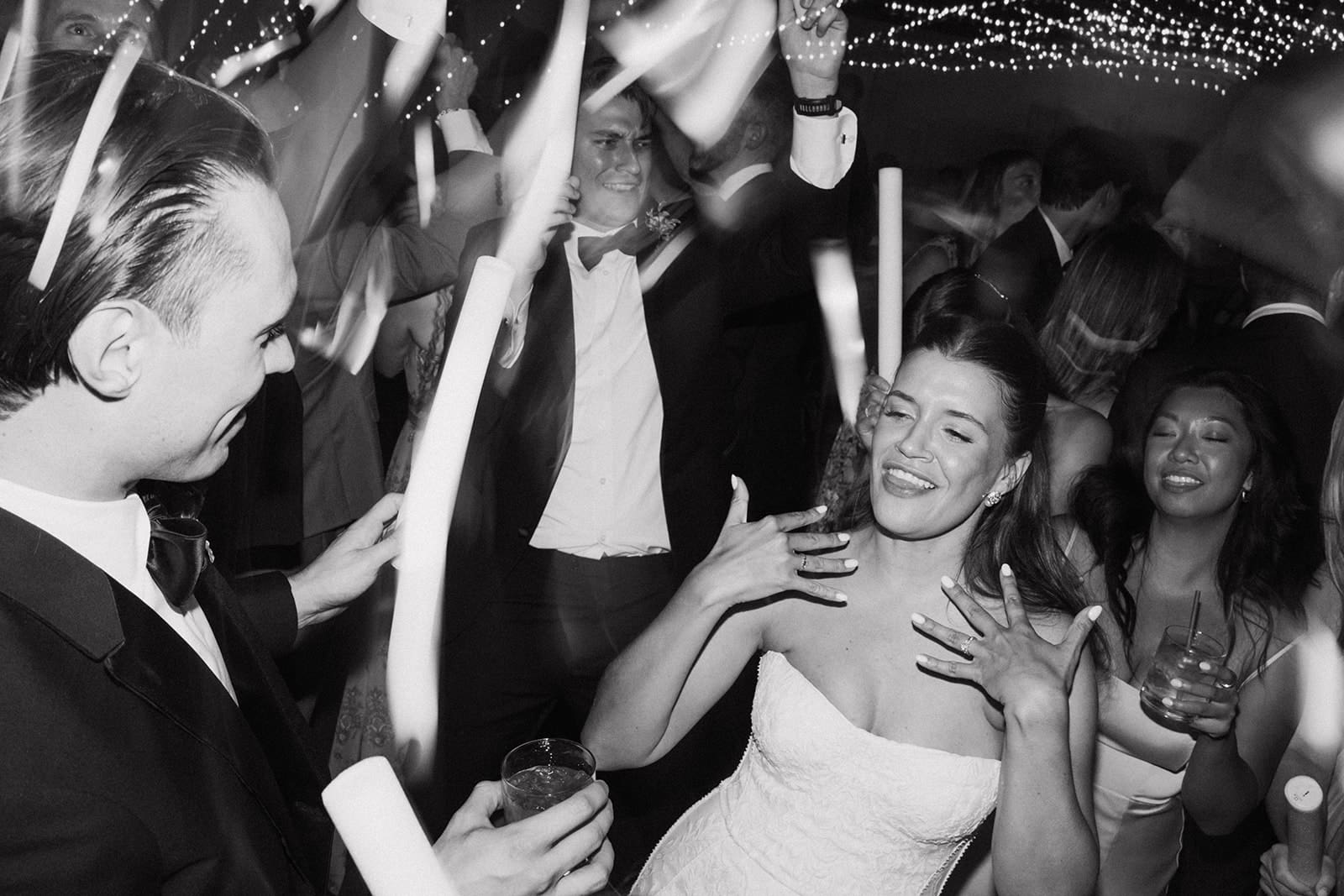 A bride and groom dancing at their wedding reception
