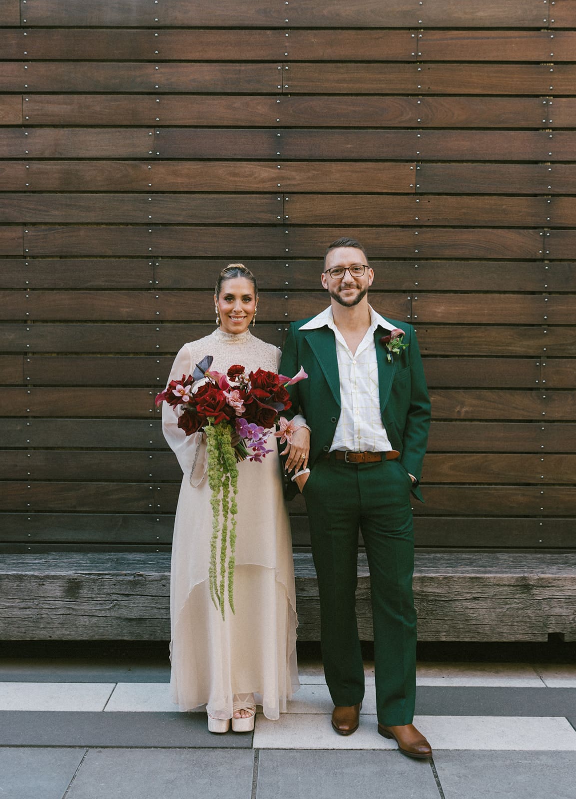 A bride and groom posing for wedding photos in Chicago