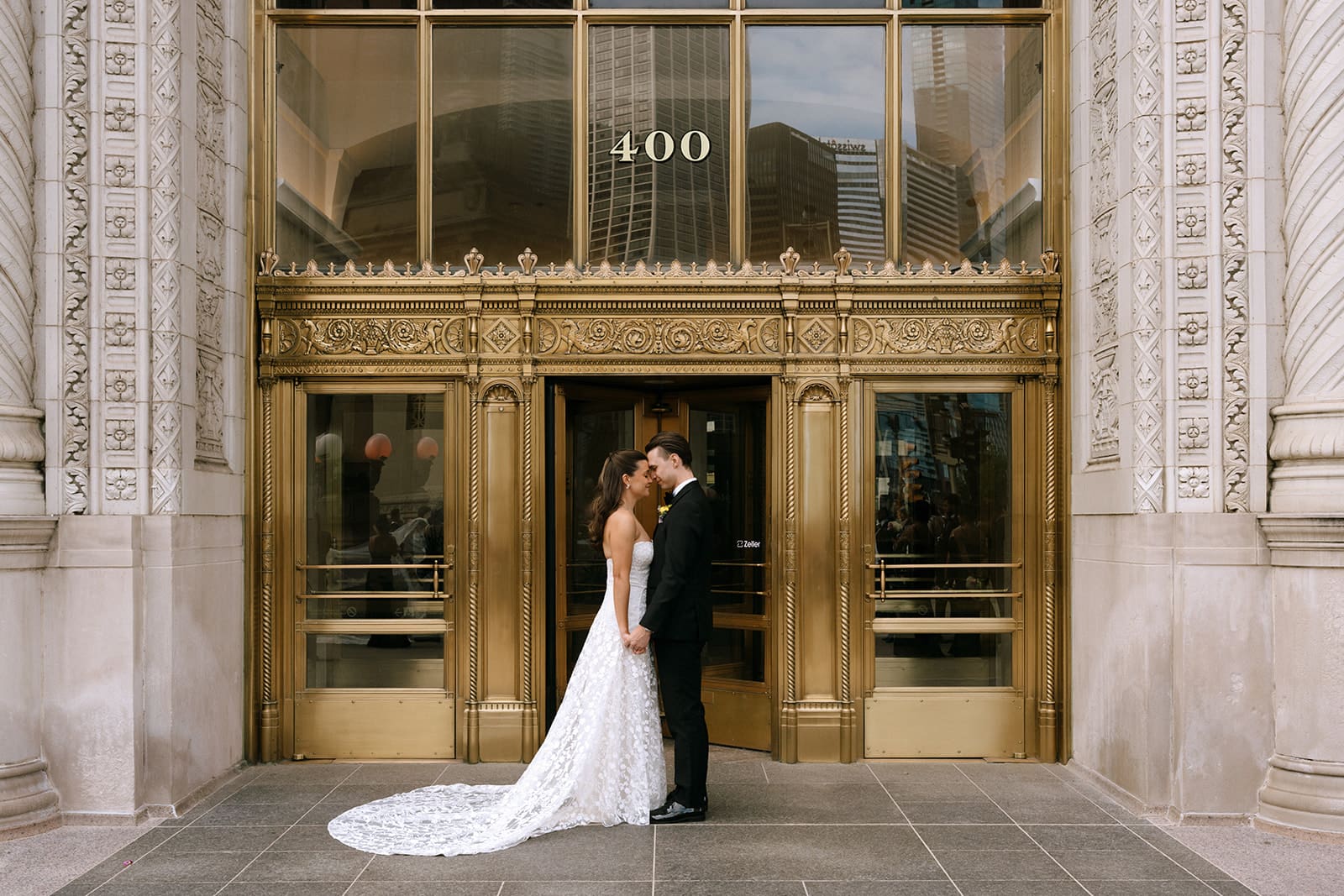 A bride and groom posing for wedding photos in Chicago