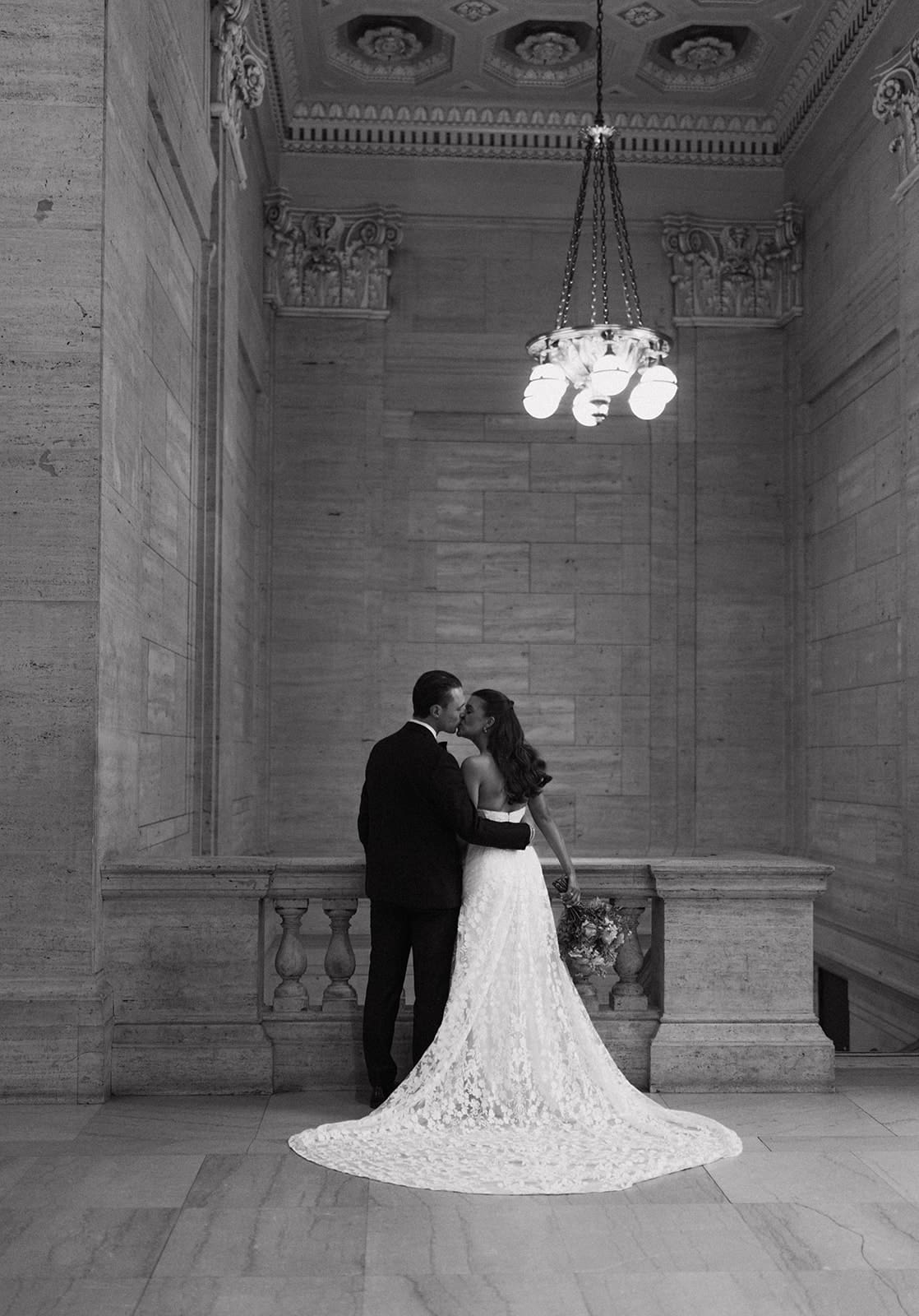 A couple taking Chicago wedding photos indoors