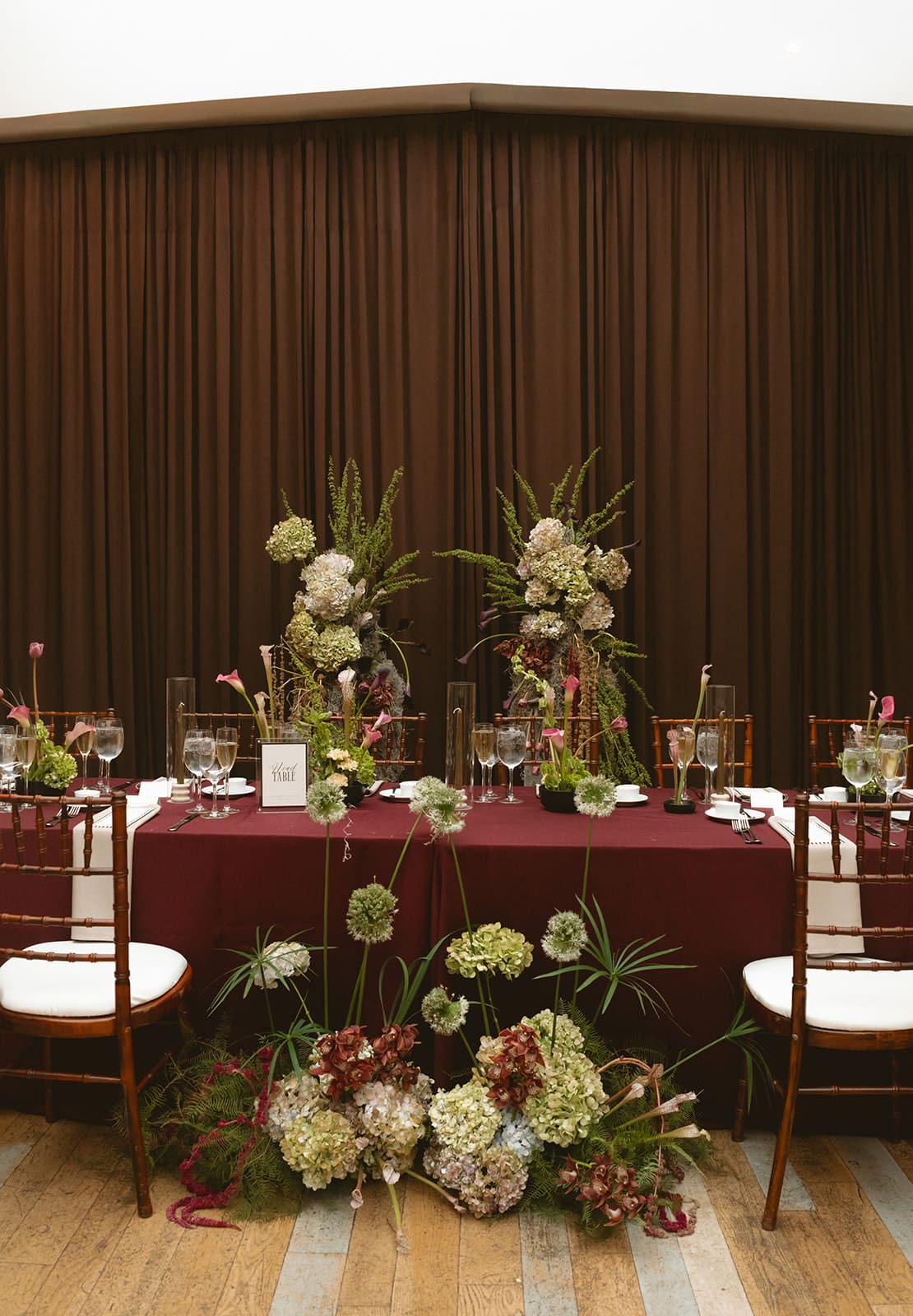 A red wedding table design in a Chicago wedding photo
