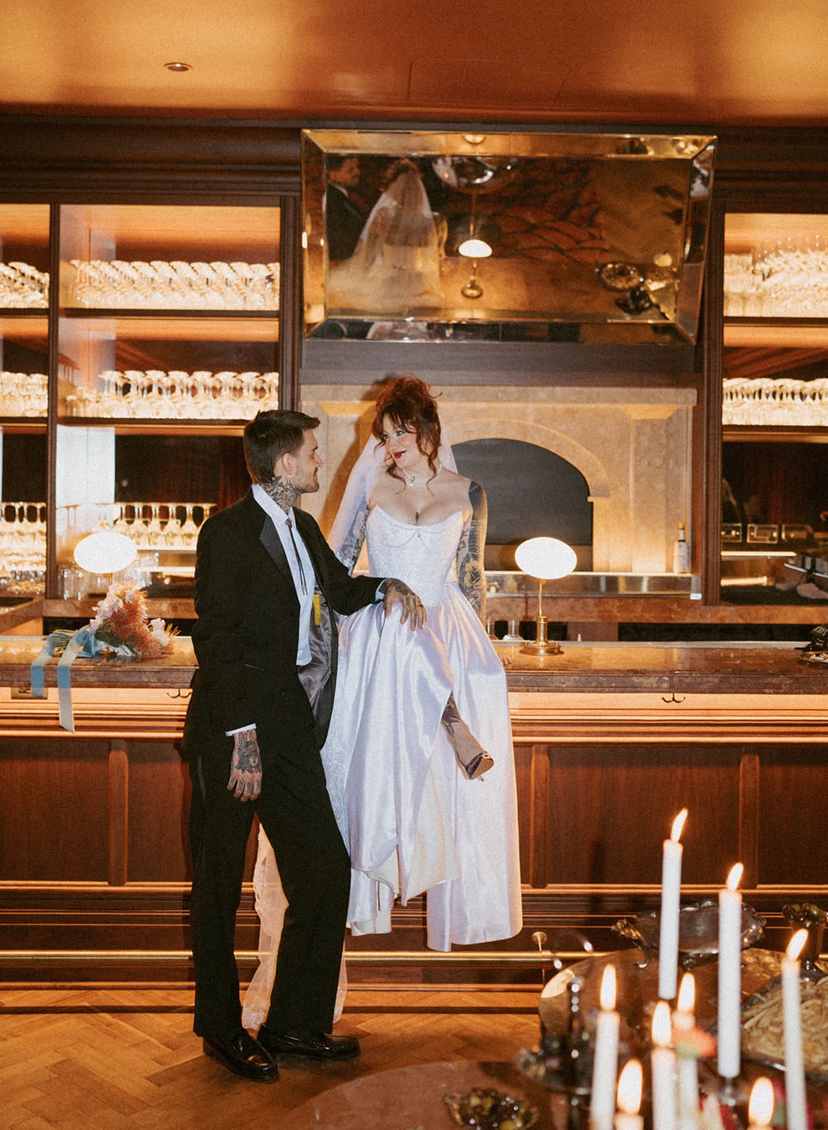 A bride and groom taking bar wedding photos in Chicago