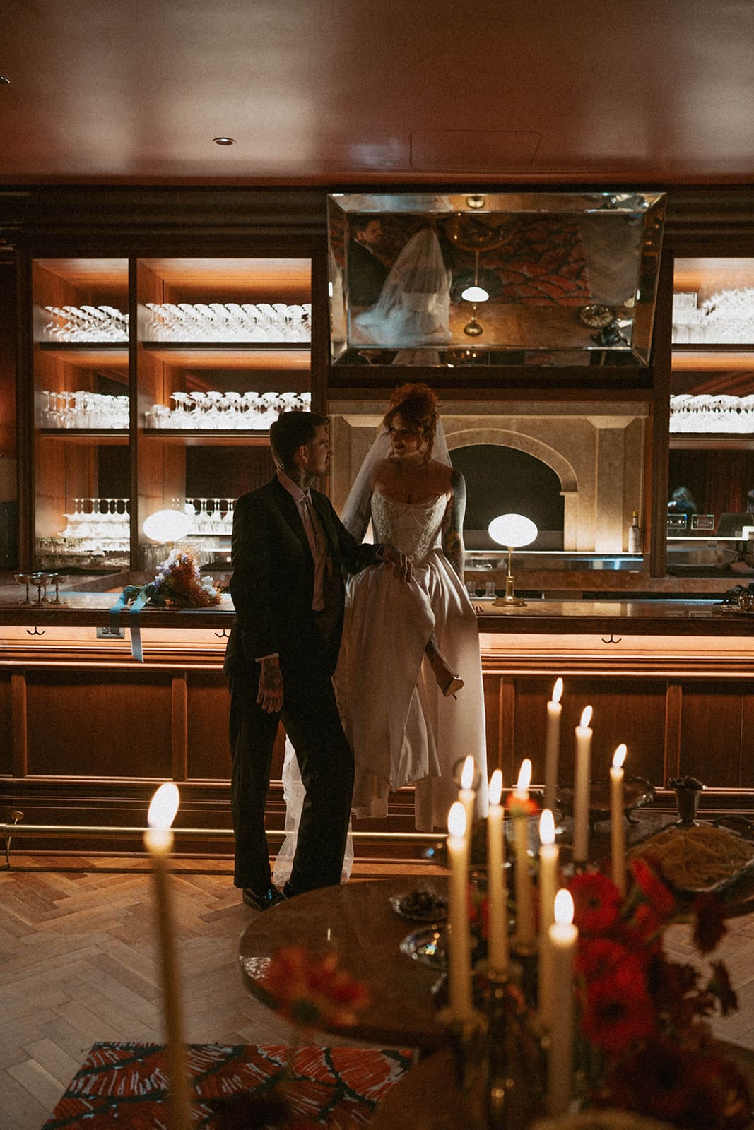 A bride and groom taking bar wedding photos in Chicago