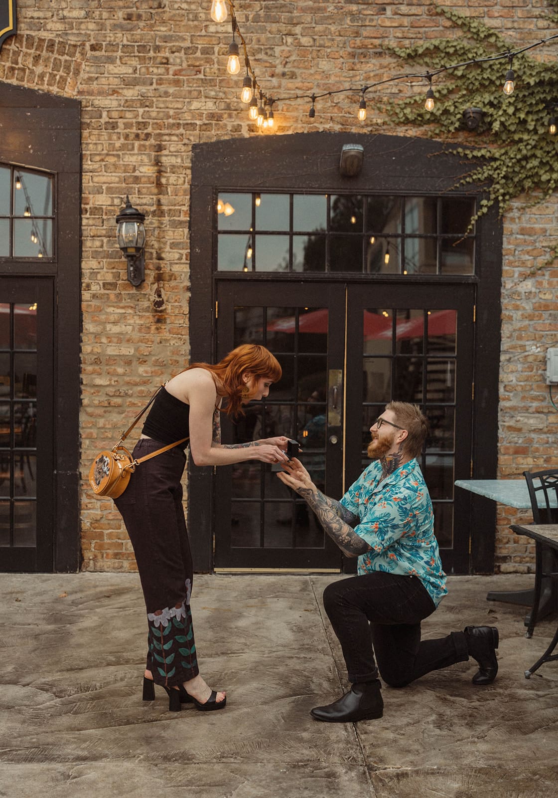 A woman walking up to her proposal, showing off proposal ideas in Chicago