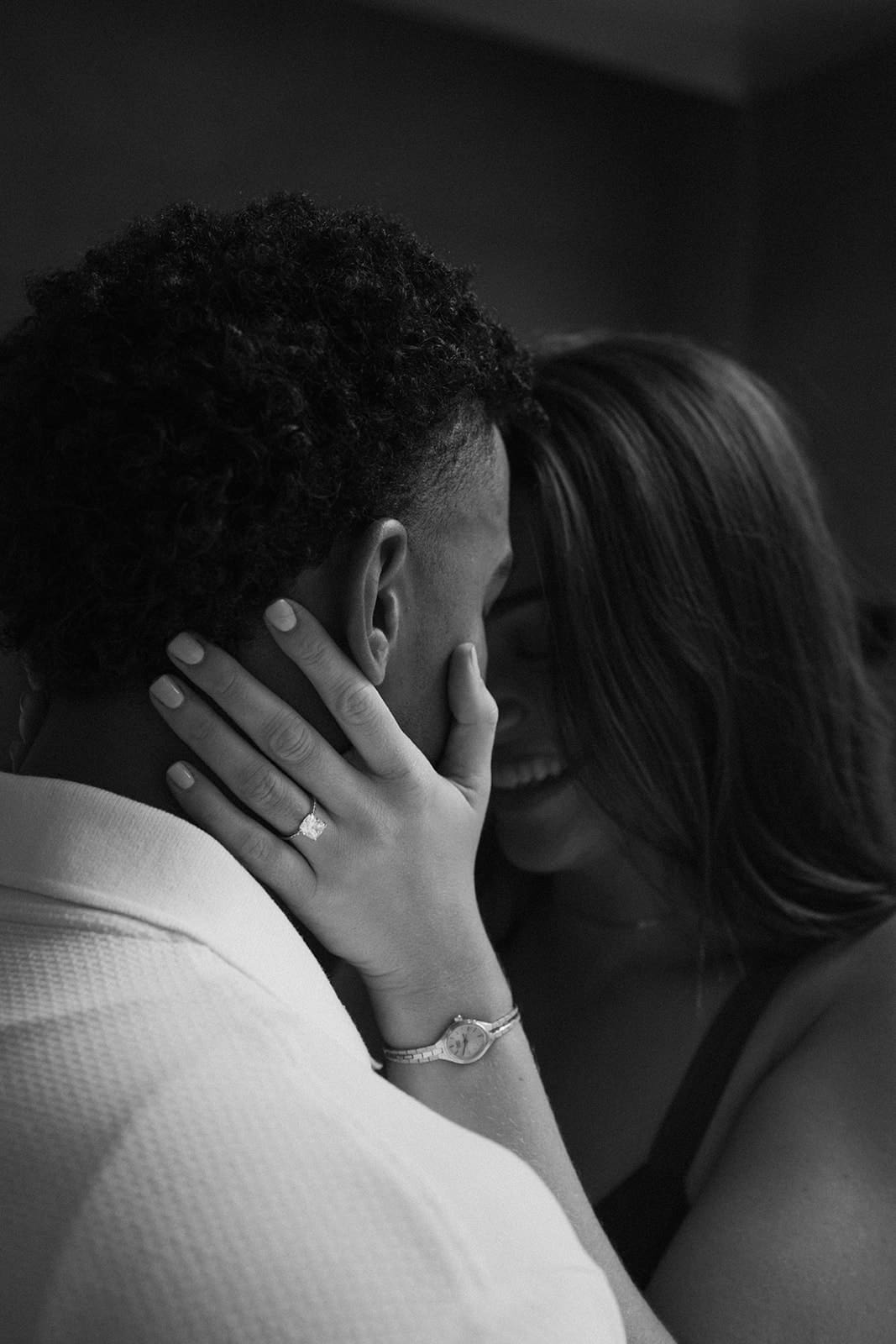 A couple posing for engagement pictures after a surprise proposal as a proposal idea
