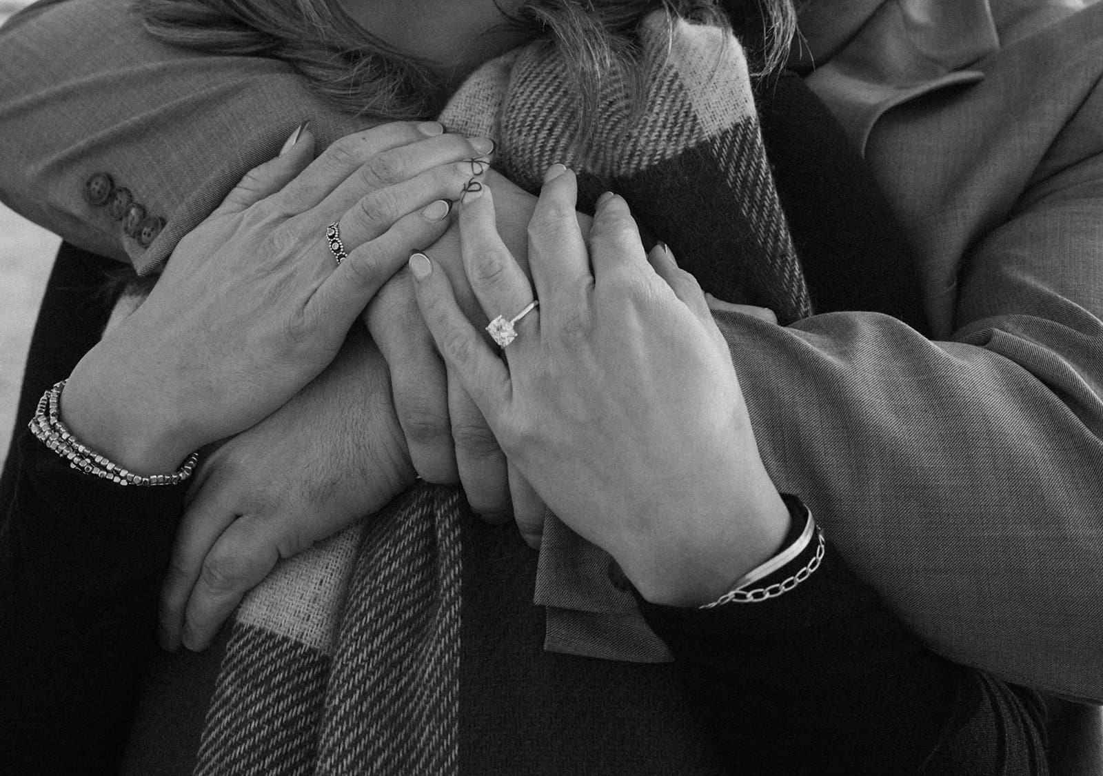 A couple hugging after getting engaged