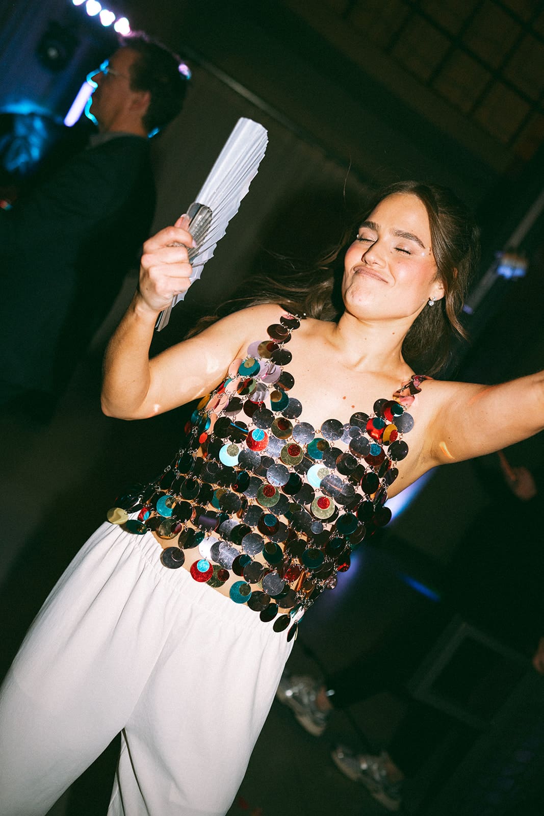 A bride's wedding reception outfit showing off 2027 wedding trends