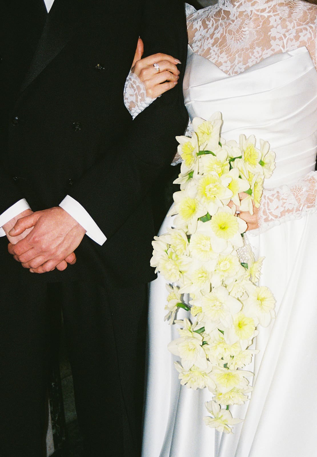 A bride and groom's outfits in a film wedding photo
