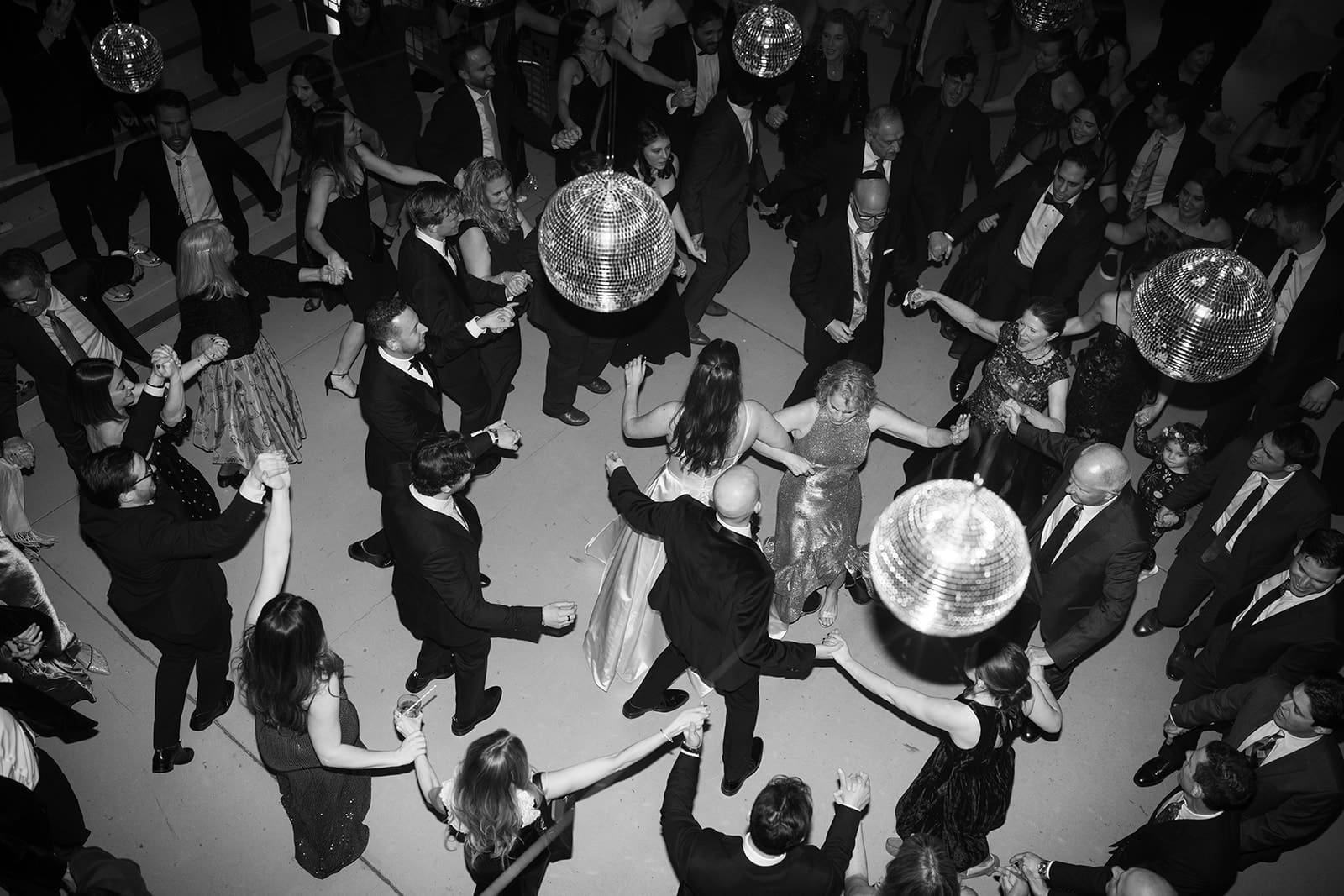 A wedding reception under disco balls