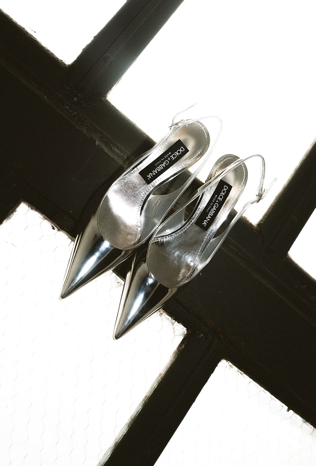 A bride's silver wedding shoes showing silver as a 2027 wedding trend
