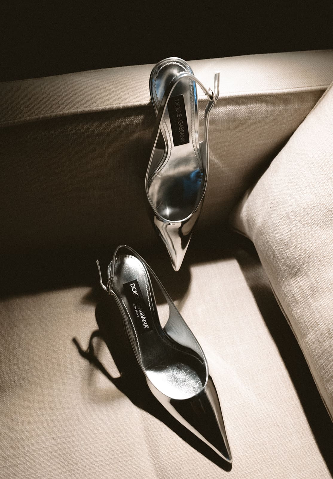 A bride's silver wedding shoes