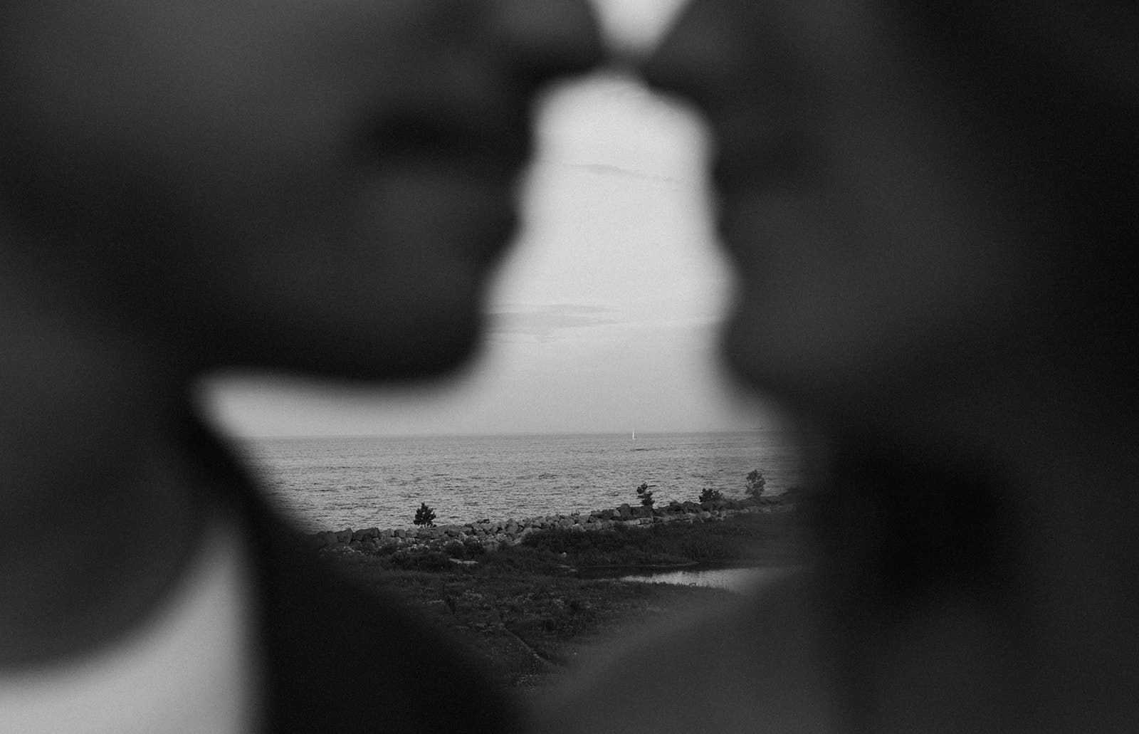 A couple posing for summer engagement photos showing when to take engagement photos