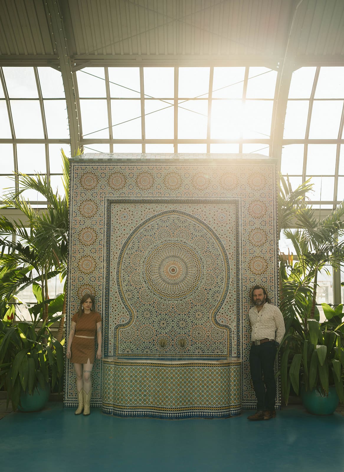 A couple at a unique engagement photoshoot location