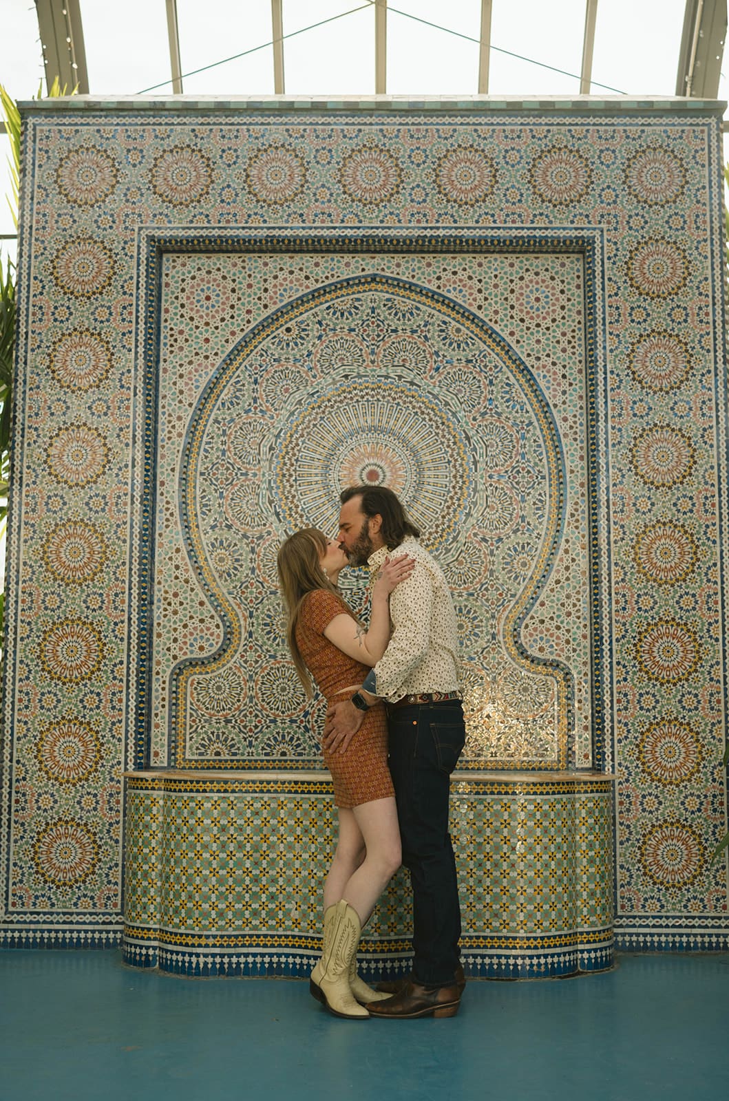 A couple at a unique engagement photoshoot location
