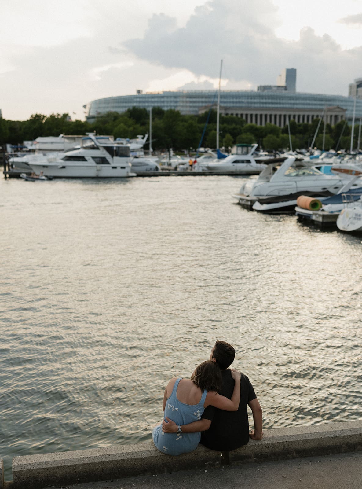 A couple at a waterfront engagement photoshoot location in Chicago