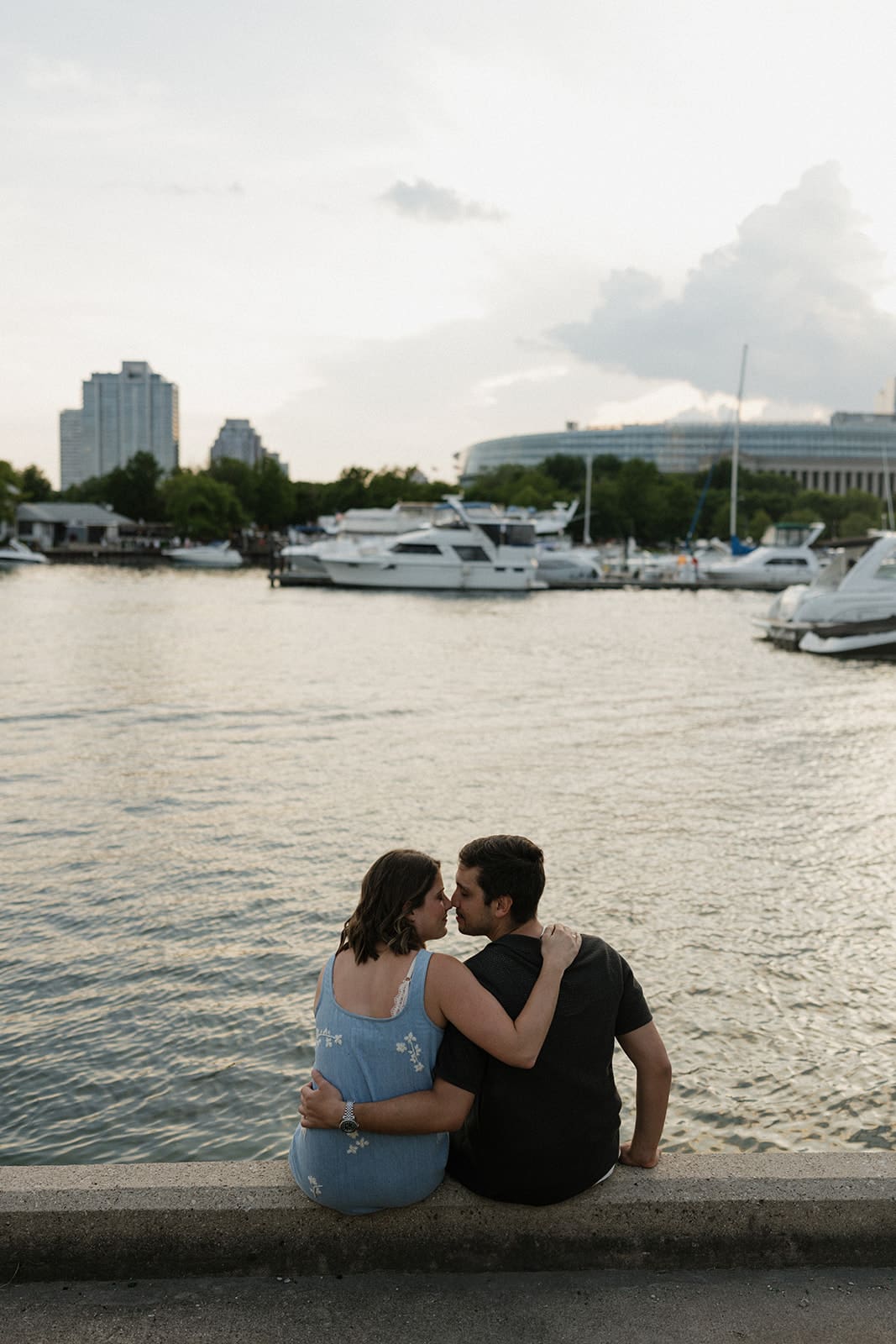A couple at a waterfront engagement photoshoot location in Chicago