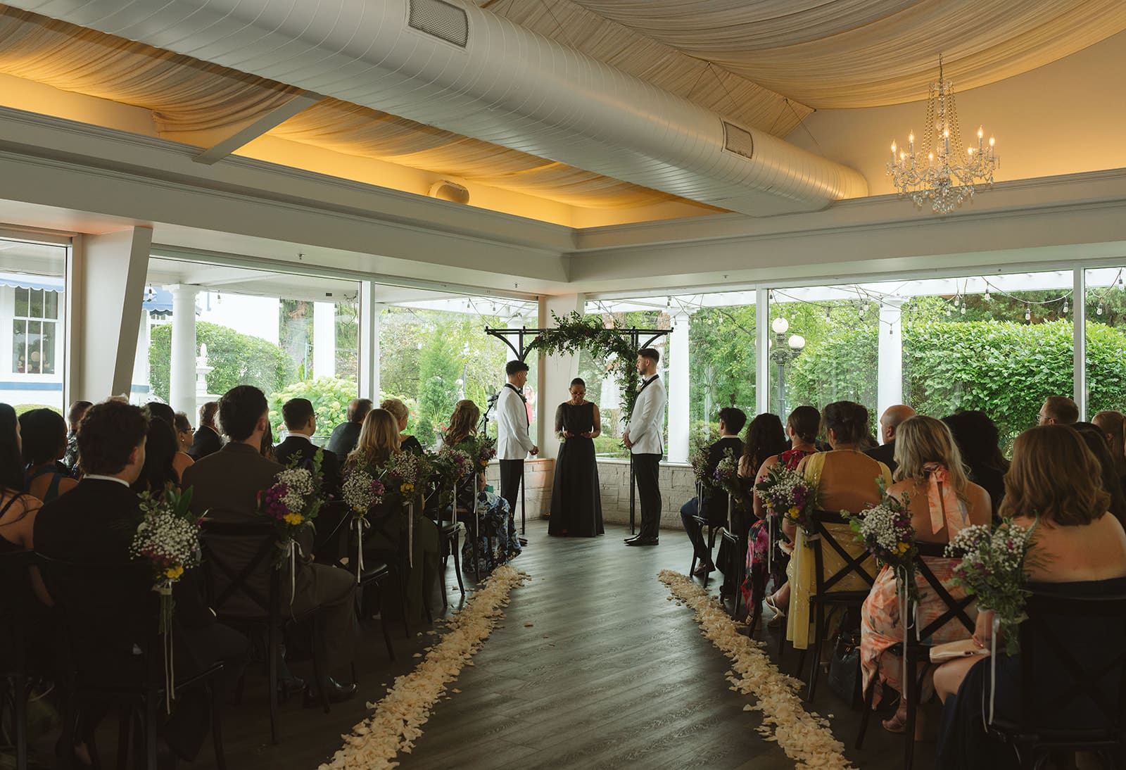 Two grooms in their wedding ceremony
