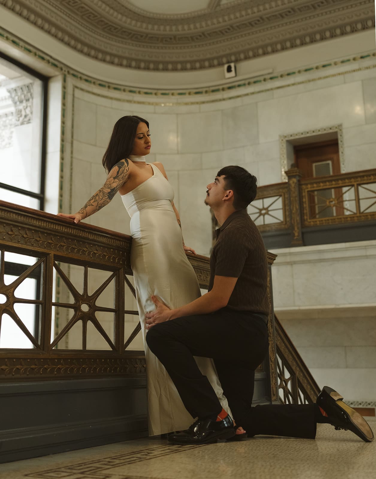 A couple posing for engagement photos as a part of their wedding planning timeline
