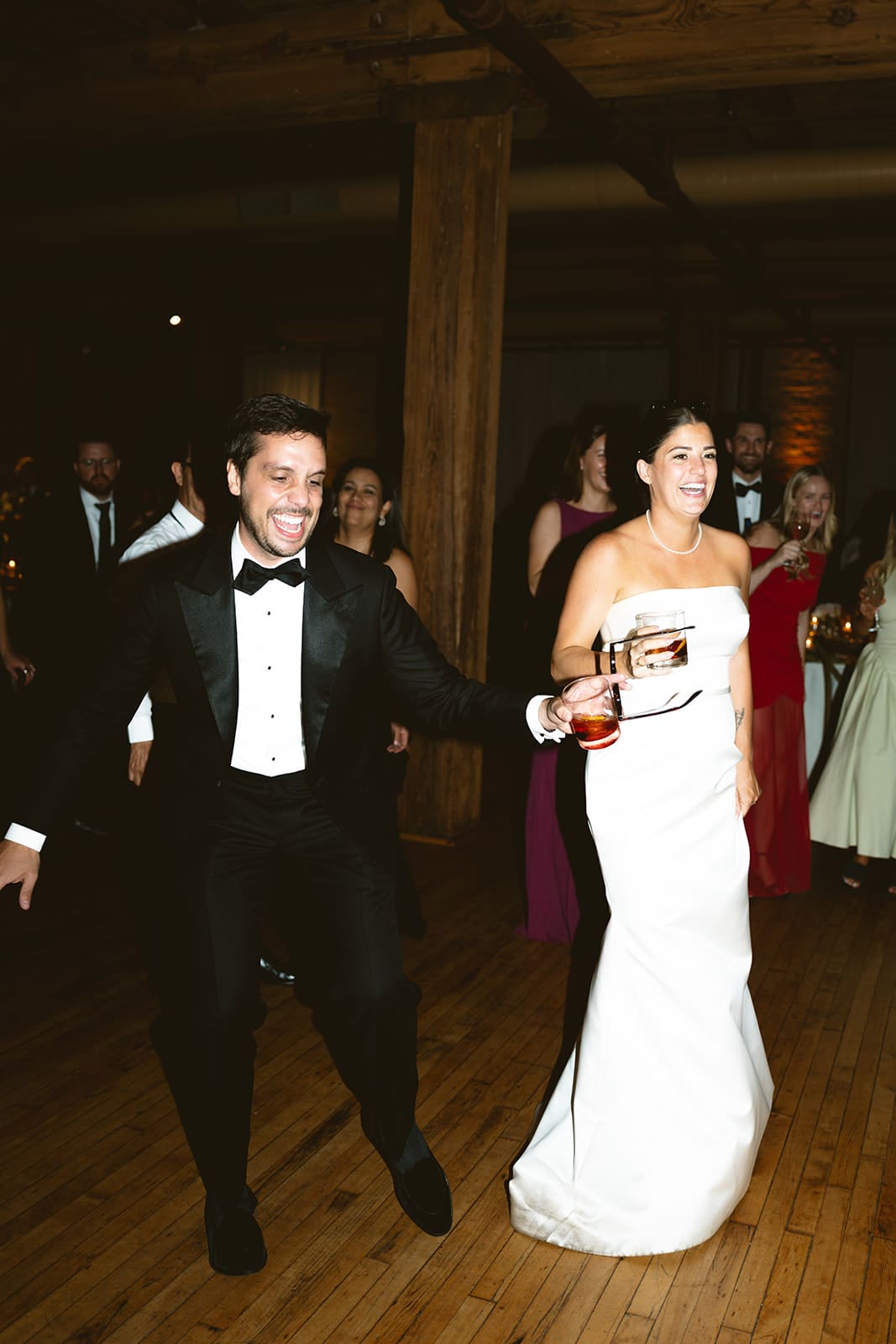 A bride and groom on the dance floor enjoying their wedding because of the wedding planning mistakes they avoided