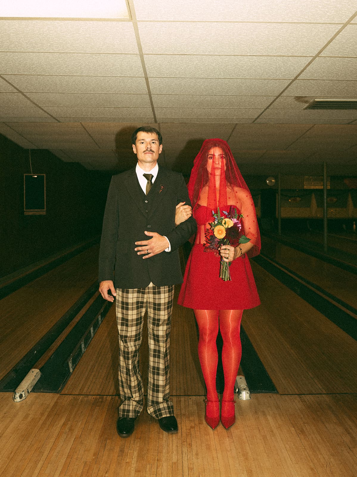 A bride and groom at a funky wedding