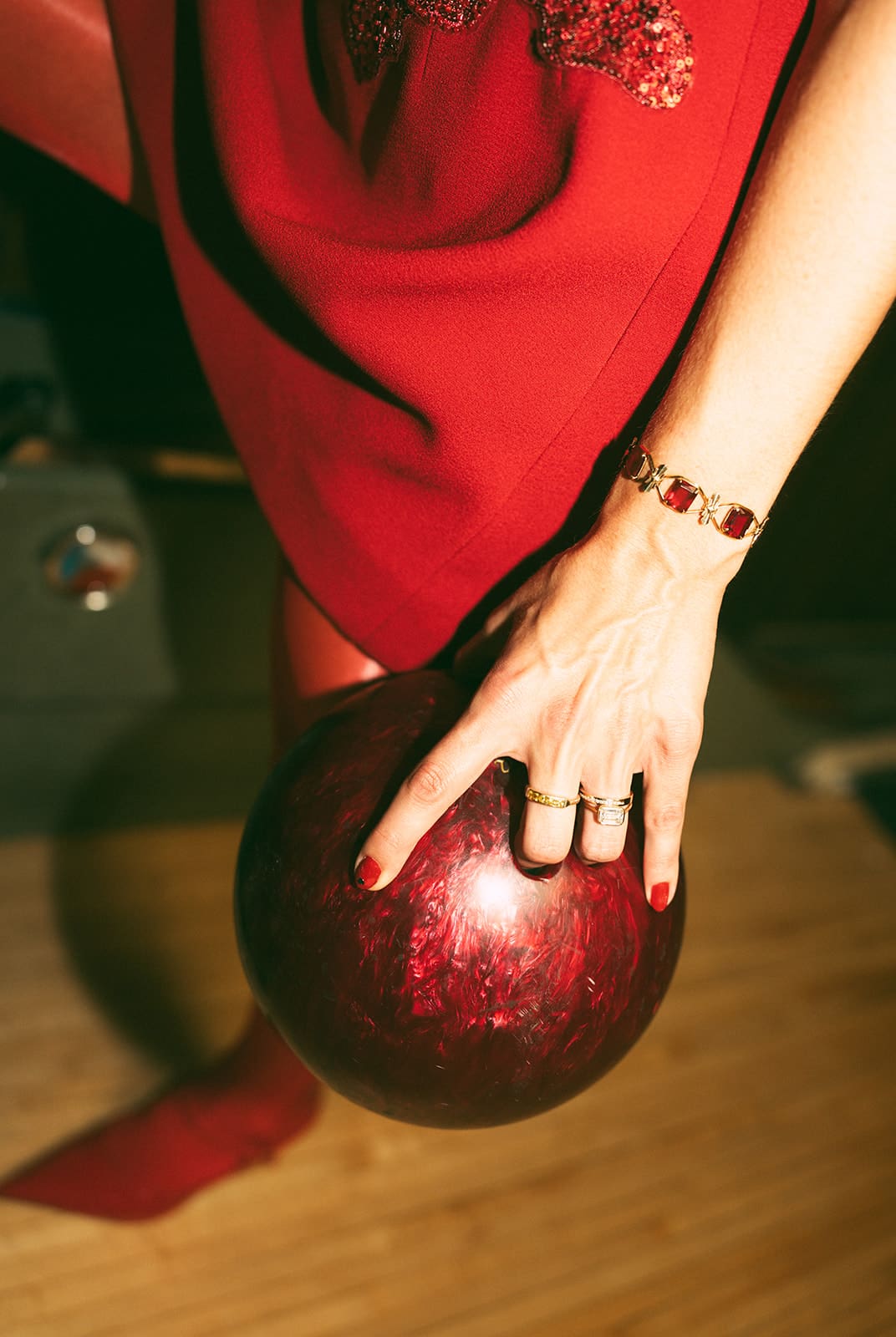 A bride holding a bowling ball